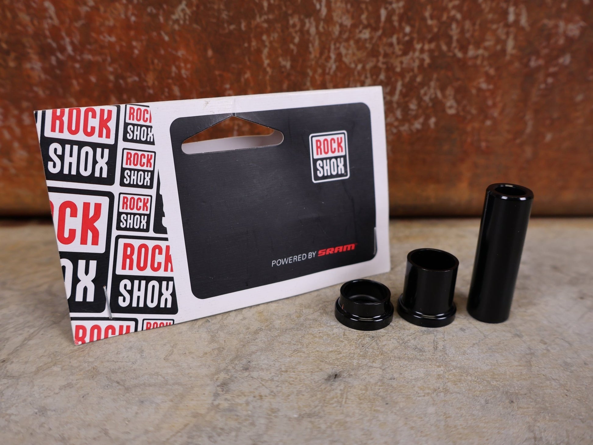 Zubehör von Rock Shox, ROCKSHOX – GLEITADAPTER / FÜHRUNGSBUCHSEN 8 × 40 MM (00.4118.159.027) vor USEDBIKES - OB.DE Hintergrund