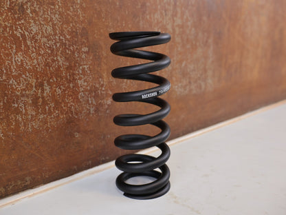 Federgabel & Dämpfer von Rock Shox, ROCKSHOX METRIC COIL FEDER SCHWARZ 400LB 151MM vor USEDBIKES-OB.DE Hintergrund