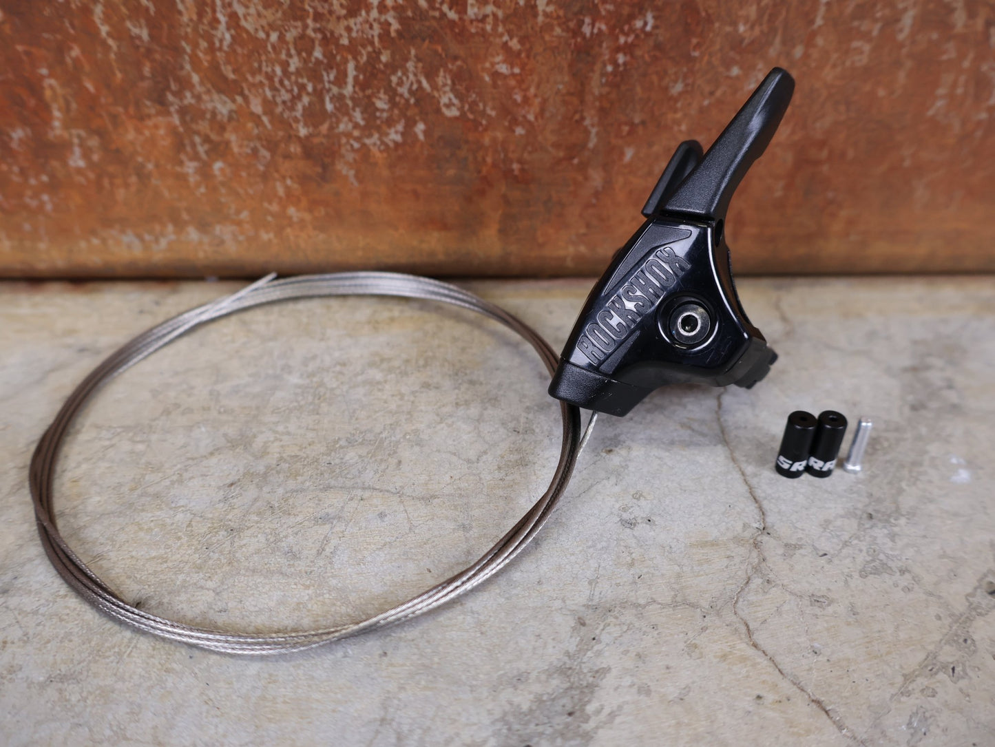 Zubehör von Sram, ROCKSHOX ONELOC REMOTE LOCKOUT HEBEL – FULL SPRINT – MTB vor USEDBIKES - OB.DE Hintergrund