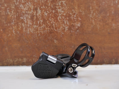 Schaltungsteile von Sram, ROCKSHOX REVERB AXS CONTROLLER REMOTE LINKS vor USEDBIKES-OB.DE Hintergrund
