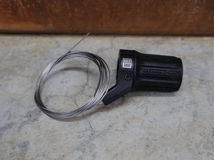 Zubehör von Sram, ROCKSHOX TWISTLOC ULTIMATE REMOTE – 2 - POSITION DREHGRIFF LINKS – 00.4318.079.000 vor USEDBIKES - OB.DE Hintergrund