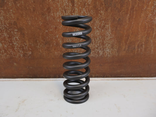 Federgabel & Dämpfer von Rock Shox, ROCKSHOX VIVID KAGE FEDER 300LB 240X76 vor USEDBIKES-OB.DE Hintergrund