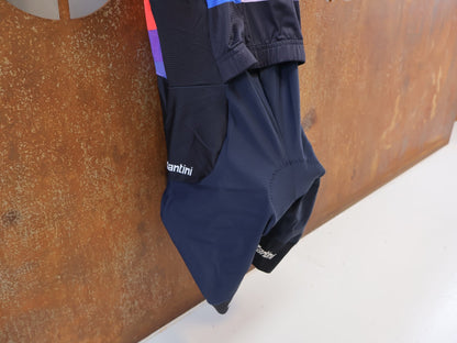 Damenbekleidung - TFR von Santini, SANTINI TREK FACTORY RACING ROADSUIT / EVIE RICHARDS EDITION EX. WORLDCHAMP / GR. XS vor USEDBIKES-OB.DE Hintergrund