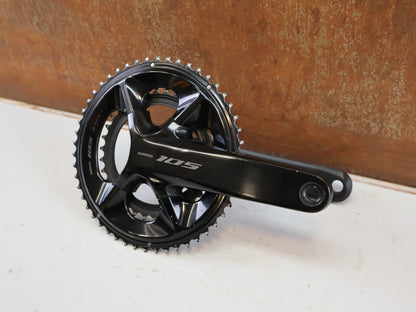 Kurbel von Shimano, SHIMANO 105 FC R7100 KURBELGARNITUR 2X12 50-34Z 175MM SCHWARZ ROAD vor USEDBIKES-OB.DE Hintergrund