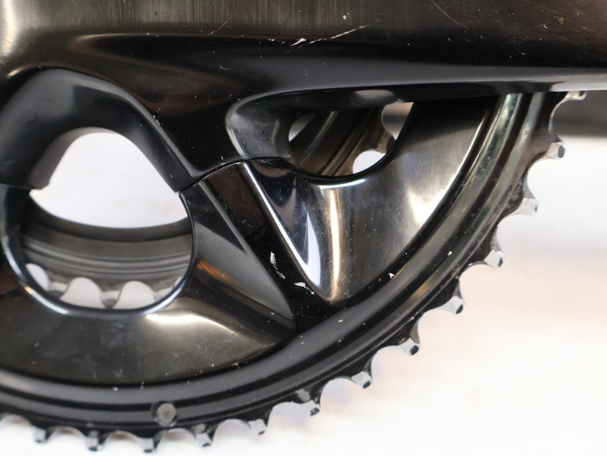 Kurbel von Shimano, SHIMANO 105 FC R7100 KURBELGARNITUR 2X12 50-34Z 175MM SCHWARZ ROAD vor USEDBIKES-OB.DE Hintergrund