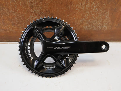 Kurbel von Shimano, SHIMANO 105 FC R7100 KURBELGARNITUR 2X12 50-34Z 175MM SCHWARZ ROAD vor USEDBIKES-OB.DE Hintergrund