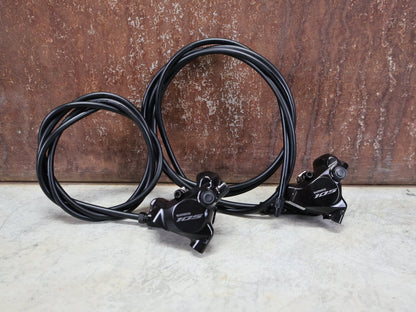 Schaltgruppen von Shimano, SHIMANO 105 R7120 / 7170 SCHALTGRUPPE 2 X 12 FACH vor USEDBIKES - OB.DE Hintergrund