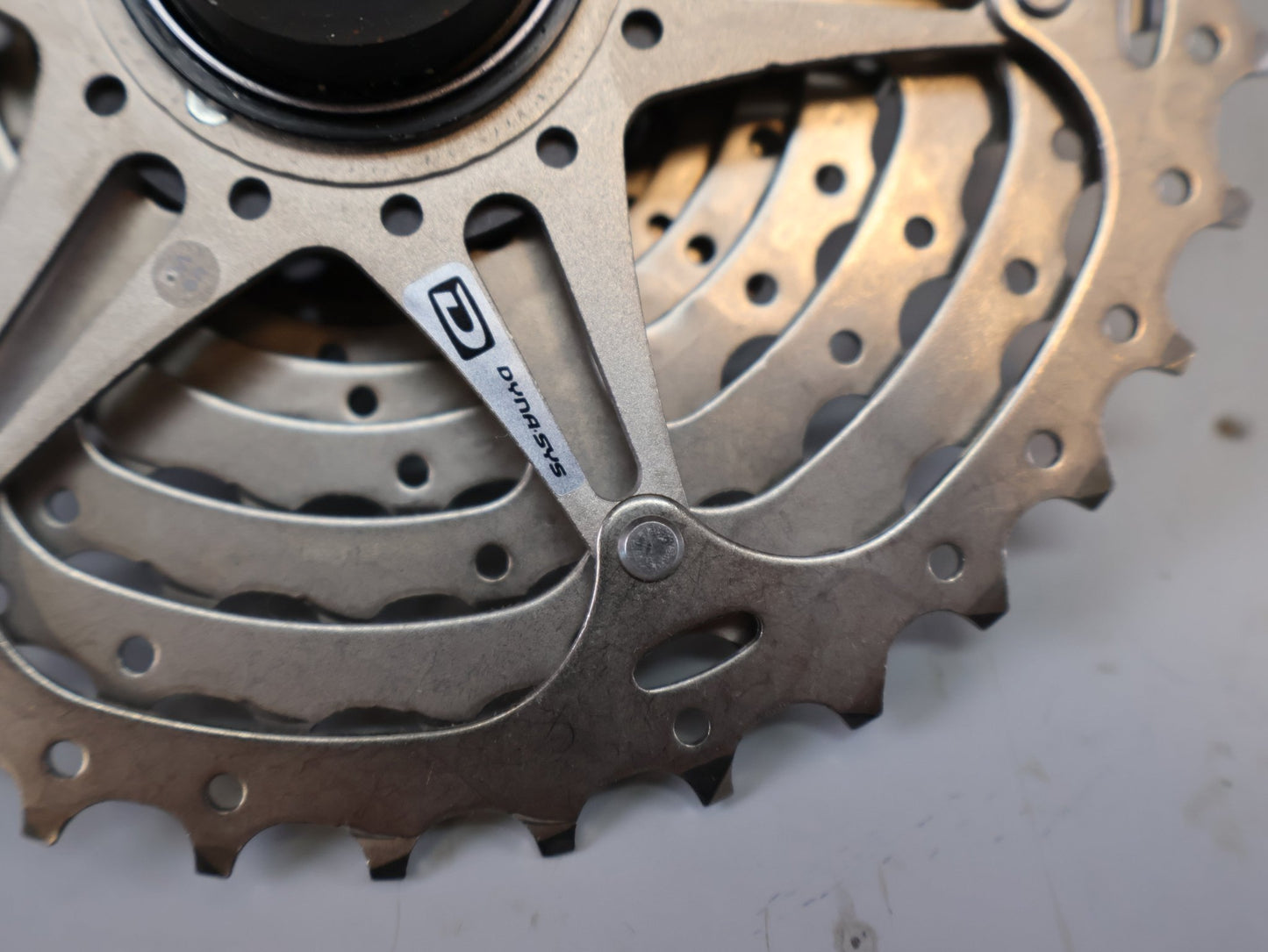 Kassette & Zahnkränze von Shimano, SHIMANO CS-HG50-10 / 10-FACH KASSETTE / MTB GRAVEL TREKKING / 11-36 ZÄHNE vor USEDBIKES-OB.DE Hintergrund