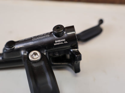 Brems-/ Schalthebel von Shimano, SHIMANO DEORE BL M6100 BREMSHEBEL RECHTS SCHWARZ vor USEDBIKES-OB.DE Hintergrund