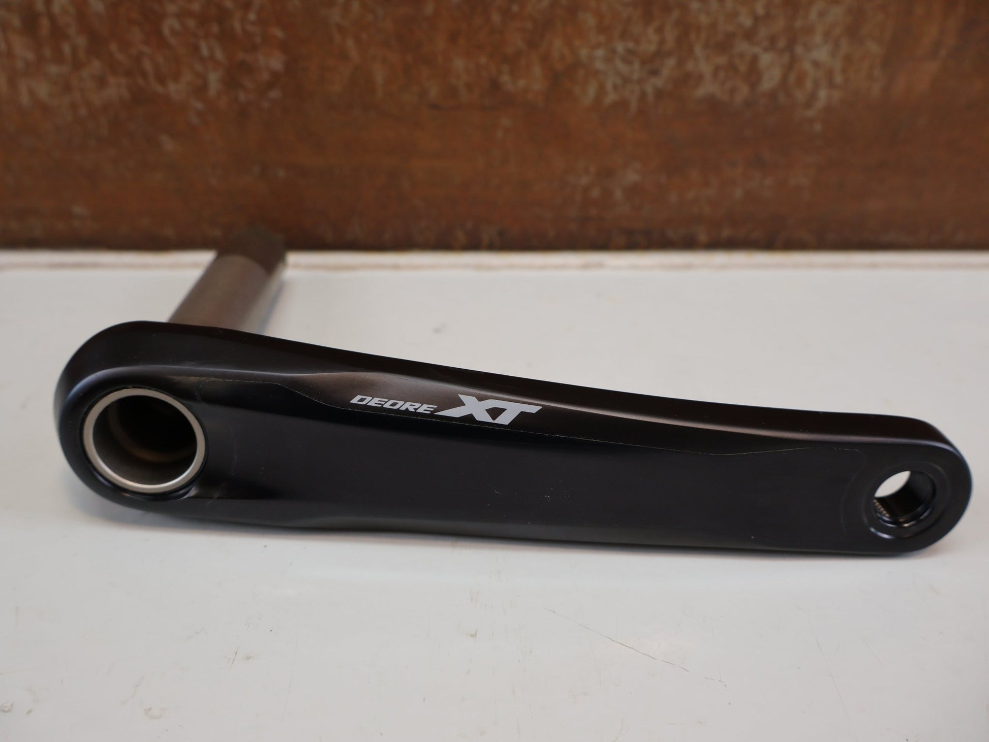 Kurbel von Shimano, SHIMANO DEORE XT FC-M8120-1 / MTB BOOST KURBEL / 1X12 FACH / 175 MM vor USEDBIKES-OB.DE Hintergrund