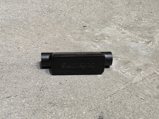 Di2 Weiche von Shimano, SHIMANO DI2 EW - WU111 ANT+ & BLOOTOOTH SENDER + EW - SD50 150MM vor USEDBIKES - OB.DE Hintergrund