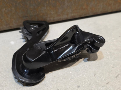 Schaltgruppen von Shimano, SHIMANO DURA ACE DI2 9270 SCHALTGRUPPE 2X12 FACH vor USEDBIKES - OB.DE Hintergrund