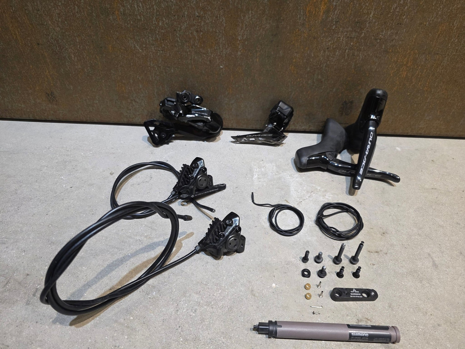 Schaltgruppen von Sram, SHIMANO DURA ACE DI2 9270 SCHALTGRUPPE 2X12 FACH vor USEDBIKES - OB.DE Hintergrund
