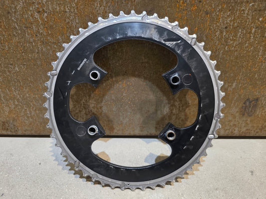 Kettenblatt von Shimano, SHIMANO DURA ACE FC - 9000 KETTENBLATT SET 52 / 36 ZÄHNE in variant_title vor USEDBIKES - OB.DE Hintergrund