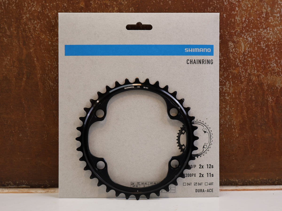 Kettenblatt von Shimano, Shimano Dura-Ace FC-R9200 Kettenblatt 36Z NH 12-fach Road vor USEDBIKES-OB.DE Hintergrund