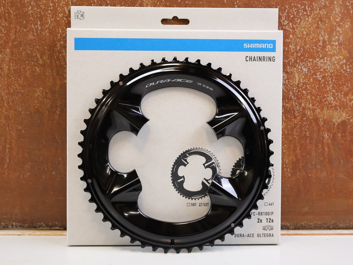 Kettenblatt von Shimano, Shimano Dura-Ace FC-R9200 Kettenblatt 52Z NH 12-fach Road vor USEDBIKES-OB.DE Hintergrund