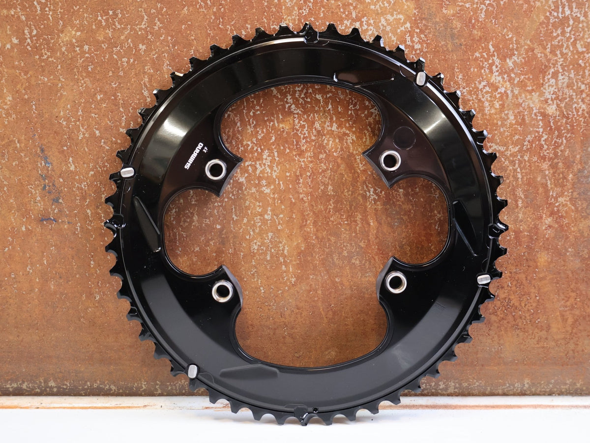 Kettenblatt von Shimano, Shimano Dura-Ace FC-R9200 Kettenblatt 52Z NH 12-fach Road vor USEDBIKES-OB.DE Hintergrund