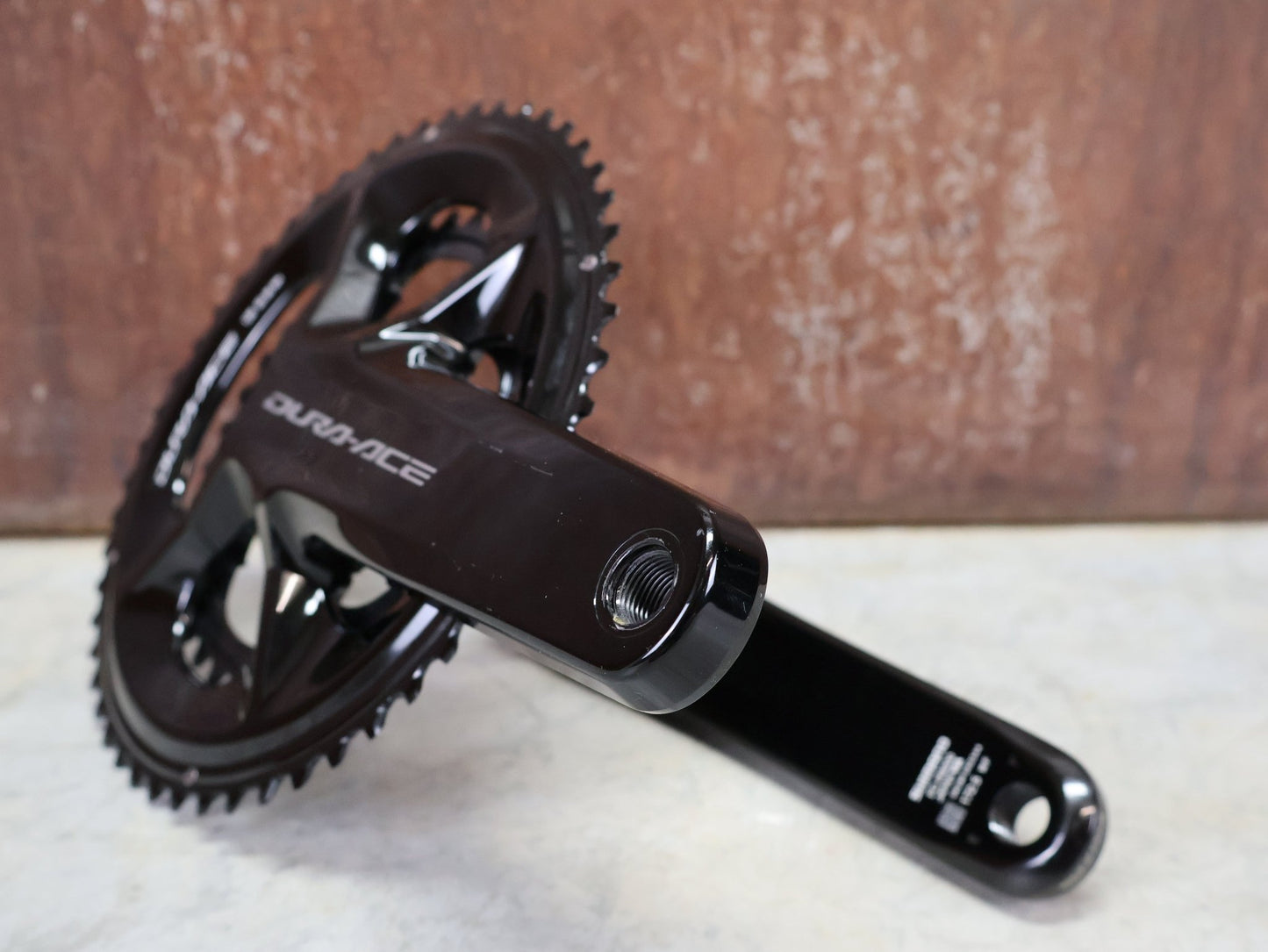 Kurbel von Shimano, SHIMANO DURA ACE FC - R9200 KURBELGARNITUR 2X11 FACH 52/36 ZÄHNE 172.5MM vor USEDBIKES - OB.DE Hintergrund