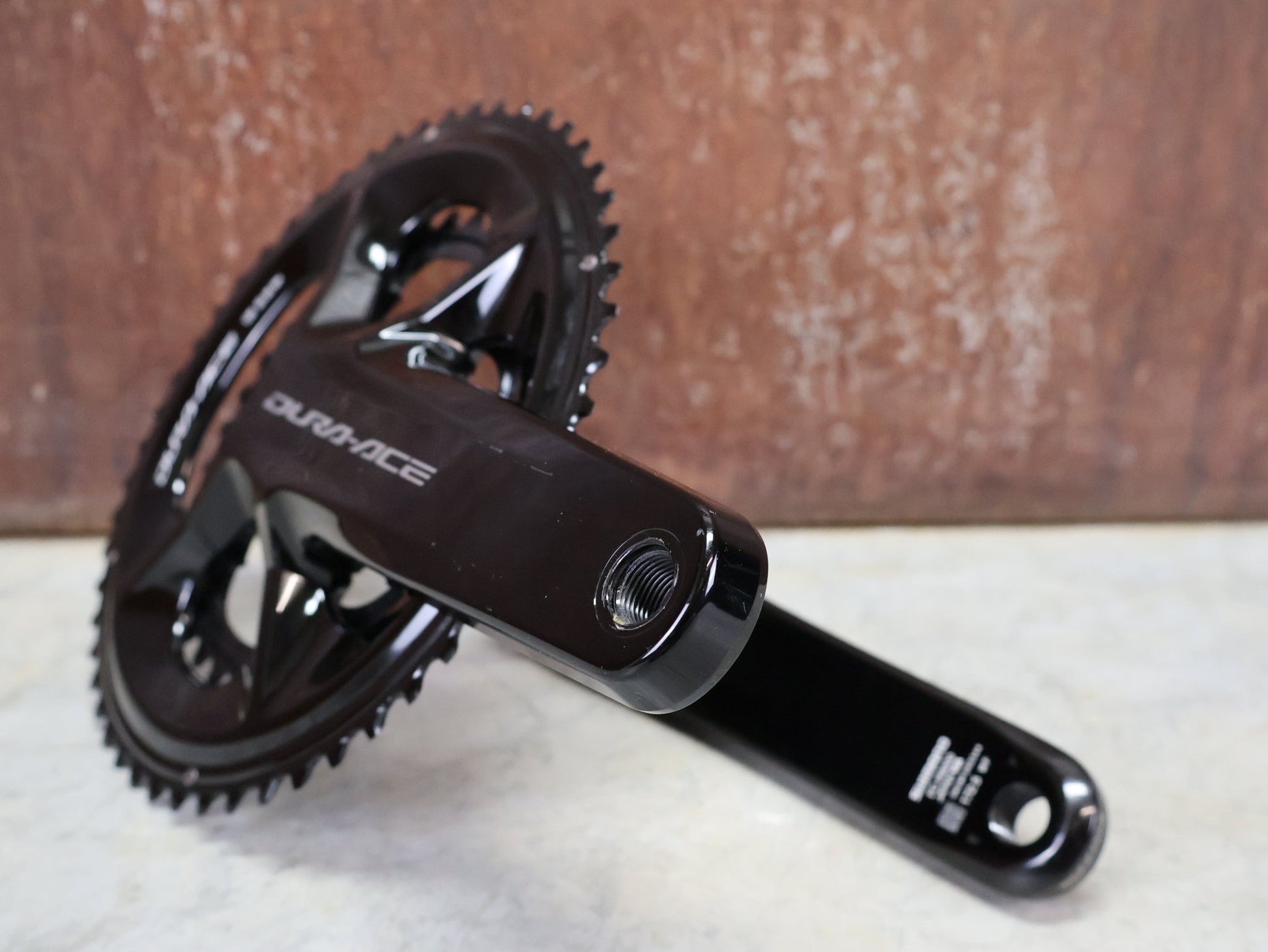 Kurbel von Shimano, SHIMANO DURA ACE FC - R9200 KURBELGARNITUR 2X11 FACH 52/36 ZÄHNE 172.5MM vor USEDBIKES - OB.DE Hintergrund