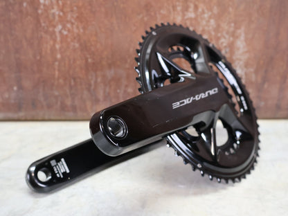 Kurbel von Shimano, SHIMANO DURA ACE FC - R9200 KURBELGARNITUR 2X11 FACH 52/36 ZÄHNE 172.5MM vor USEDBIKES - OB.DE Hintergrund