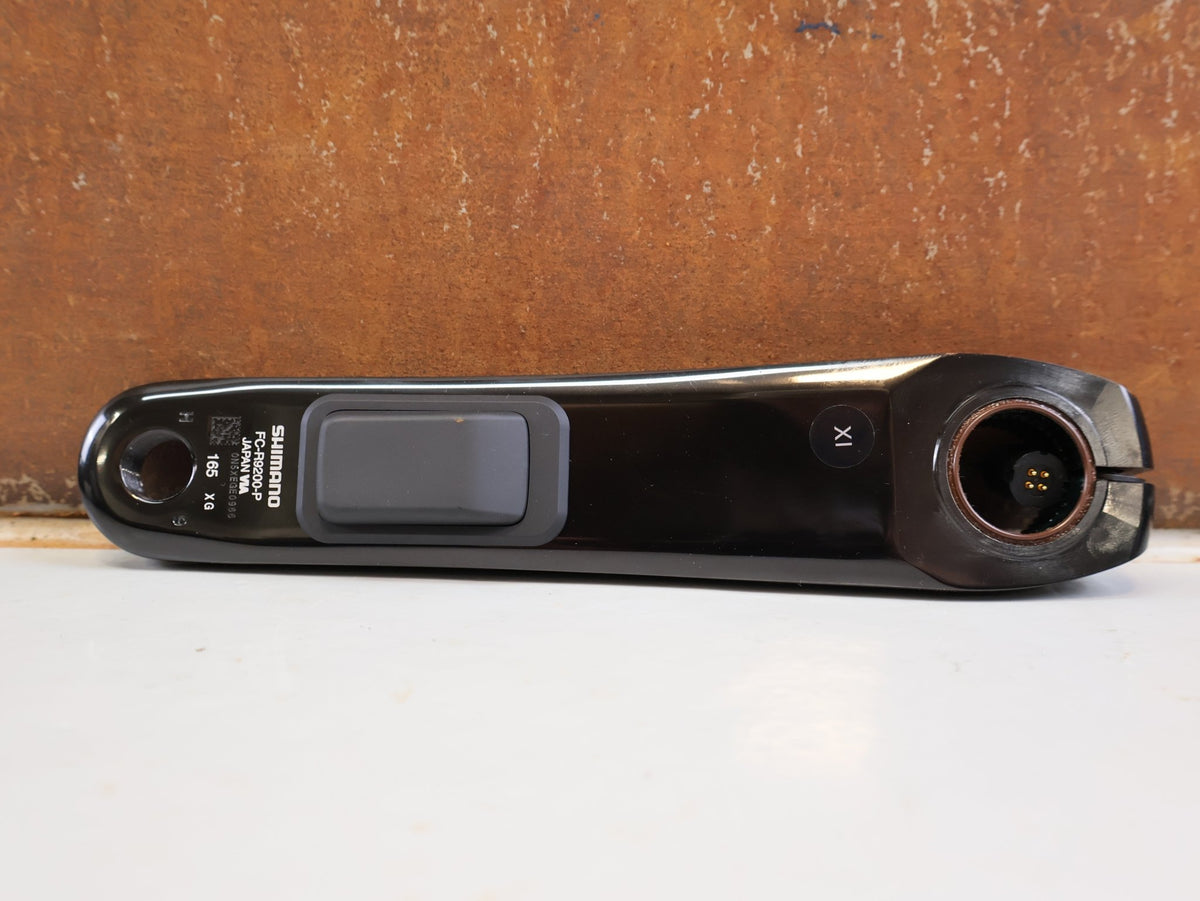 Powermeter von Shimano, Shimano Dura-Ace FC-R9200-P Powermeter Kurbel 165mm Road vor USEDBIKES-OB.DE Hintergrund