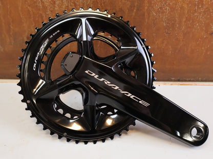 Kurbel von Shimano, Shimano Dura-Ace FC-R9200-P Powermeter Kurbel 170mm 50-34 vor USEDBIKES-OB.DE Hintergrund