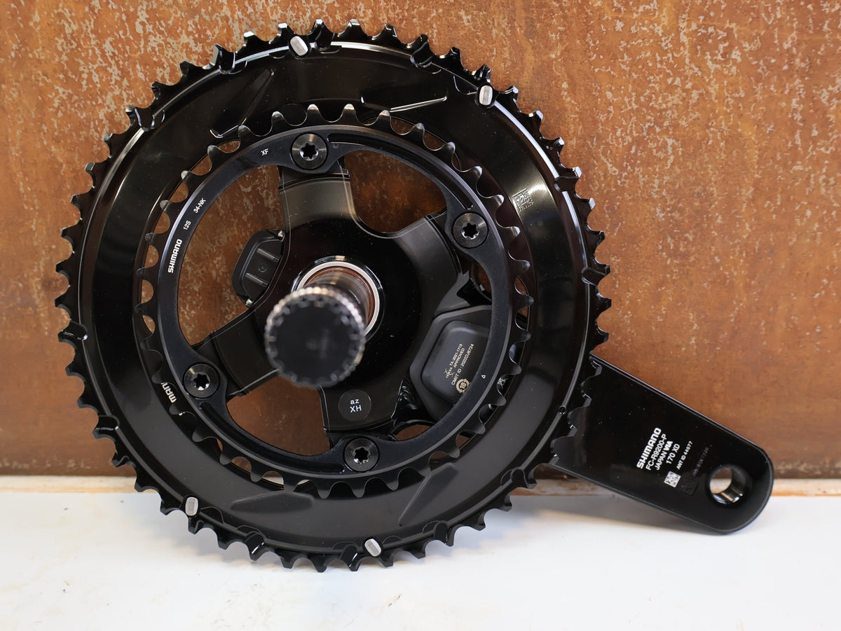 Kurbel von Shimano, Shimano Dura-Ace FC-R9200-P Powermeter Kurbel 170mm 50-34 vor USEDBIKES-OB.DE Hintergrund