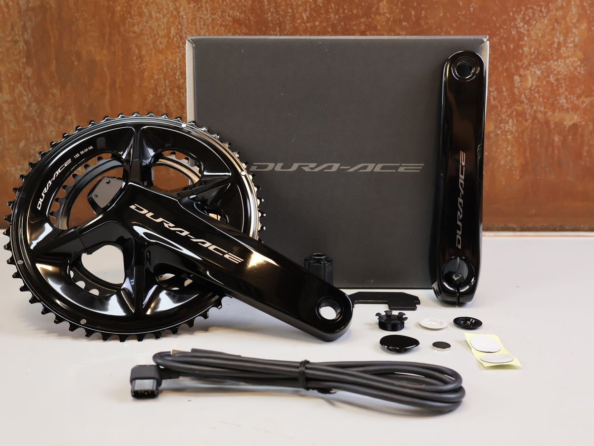 Kurbel von Shimano, Shimano Dura-Ace FC-R9200-P Powermeter Kurbel 170mm 50-34 vor USEDBIKES-OB.DE Hintergrund