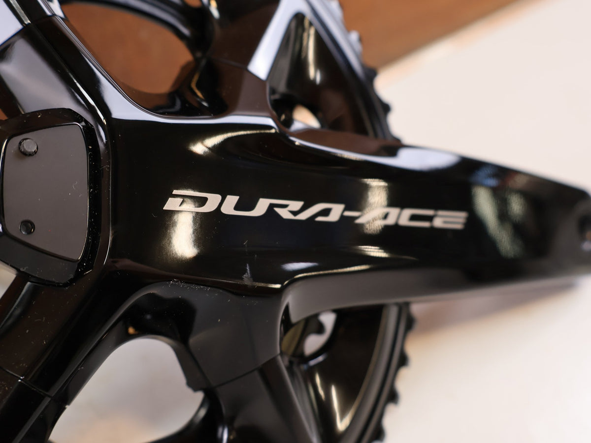 Kurbel von Shimano, Shimano Dura-Ace FC-R9200-P Powermeter Kurbel 170mm 50-34 vor USEDBIKES-OB.DE Hintergrund
