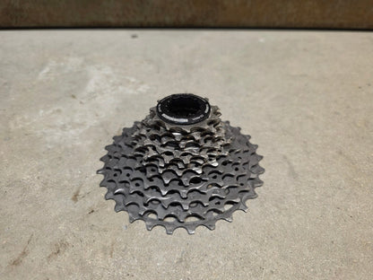 Kassette & Zahnkränze von Shimano, SHIMANO DURA ACE KASSETTE CS - R9200 12 FACH 11 - 30 ZÄHNE vor USEDBIKES - OB.DE Hintergrund