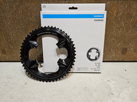 Kettenblatt von Shimano, SHIMANO DURA ACE KETTENBLATT FC - R9200 / CR - R9200 50 / 52 / 54ZÄHNE in variant_title vor USEDBIKES - OB.DE Hintergrund