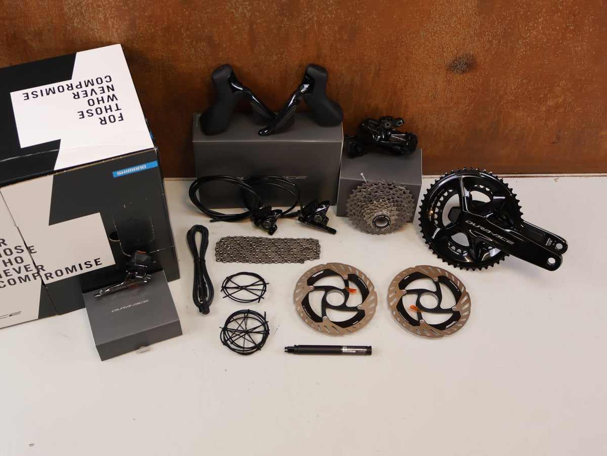 Schaltgruppen von Shimano, SHIMANO DURA ACE R9200 POWERMETER GRUPPE 165MM 52-36 11-34 12F vor USEDBIKES-OB.DE Hintergrund