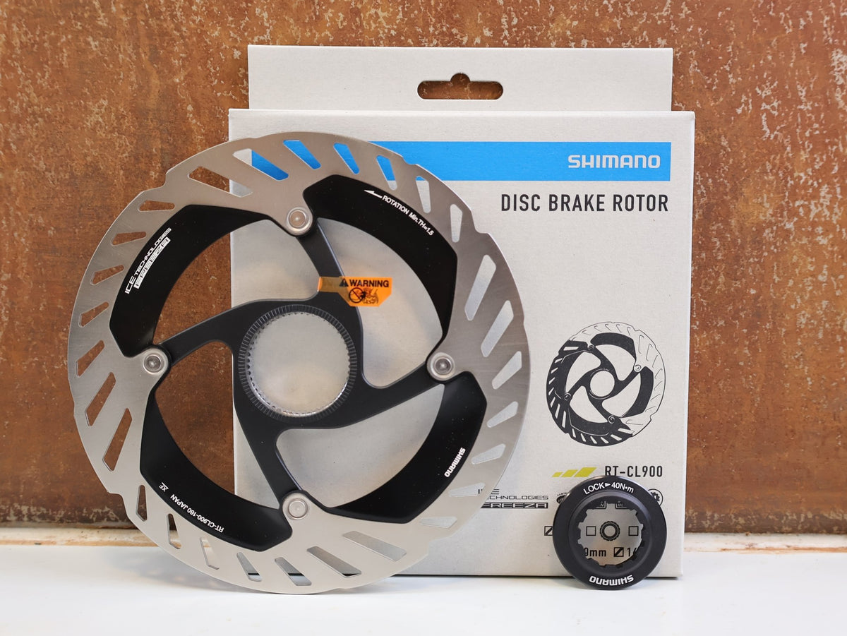 Bremsscheibe von Shimano, Shimano Dura-Ace RT-CL900 Bremsscheibe 160mm Center Lock vor USEDBIKES-OB.DE Hintergrund