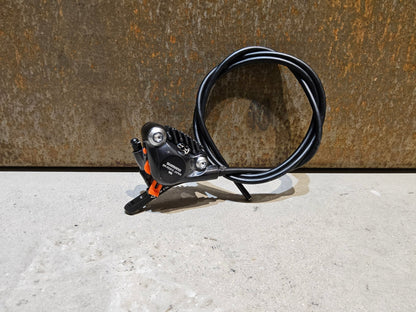 Bremse von Shimano, SHIMANO GRX BREMSSATTEL BR - RX810 - F / - R FLATMOUNT VORNE / HINTEN INKL. LEITUNG in variant_title vor USEDBIKES - OB.DE Hintergrund