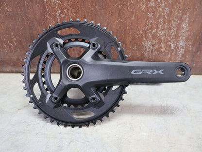 Kurbel von Shimano, SHIMANO GRX FC - RX610 KURBELGARNITUR 2 X 12FACH 46/30ZÄHNE 165 - 175MM vor USEDBIKES - OB.DE Hintergrund