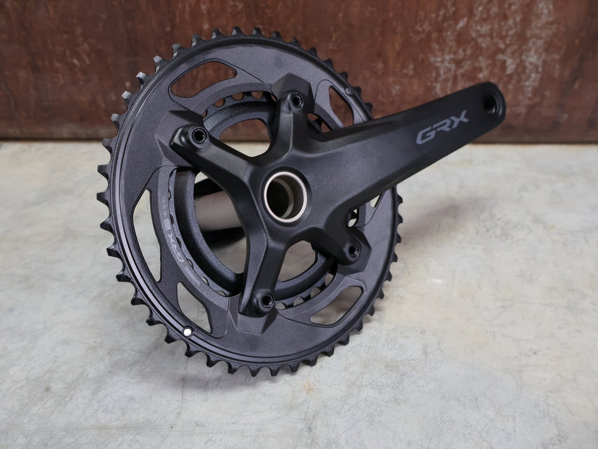 Kurbel von Shimano, SHIMANO GRX FC - RX610 KURBELGARNITUR 2 X 12FACH 46/30ZÄHNE 165 - 175MM vor USEDBIKES - OB.DE Hintergrund