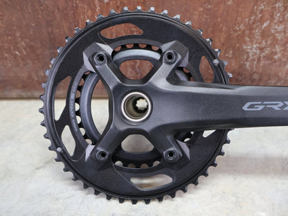 Kurbel von Shimano, SHIMANO GRX FC - RX610 KURBELGARNITUR 2 X 12FACH 46/30ZÄHNE 165 - 175MM vor USEDBIKES - OB.DE Hintergrund