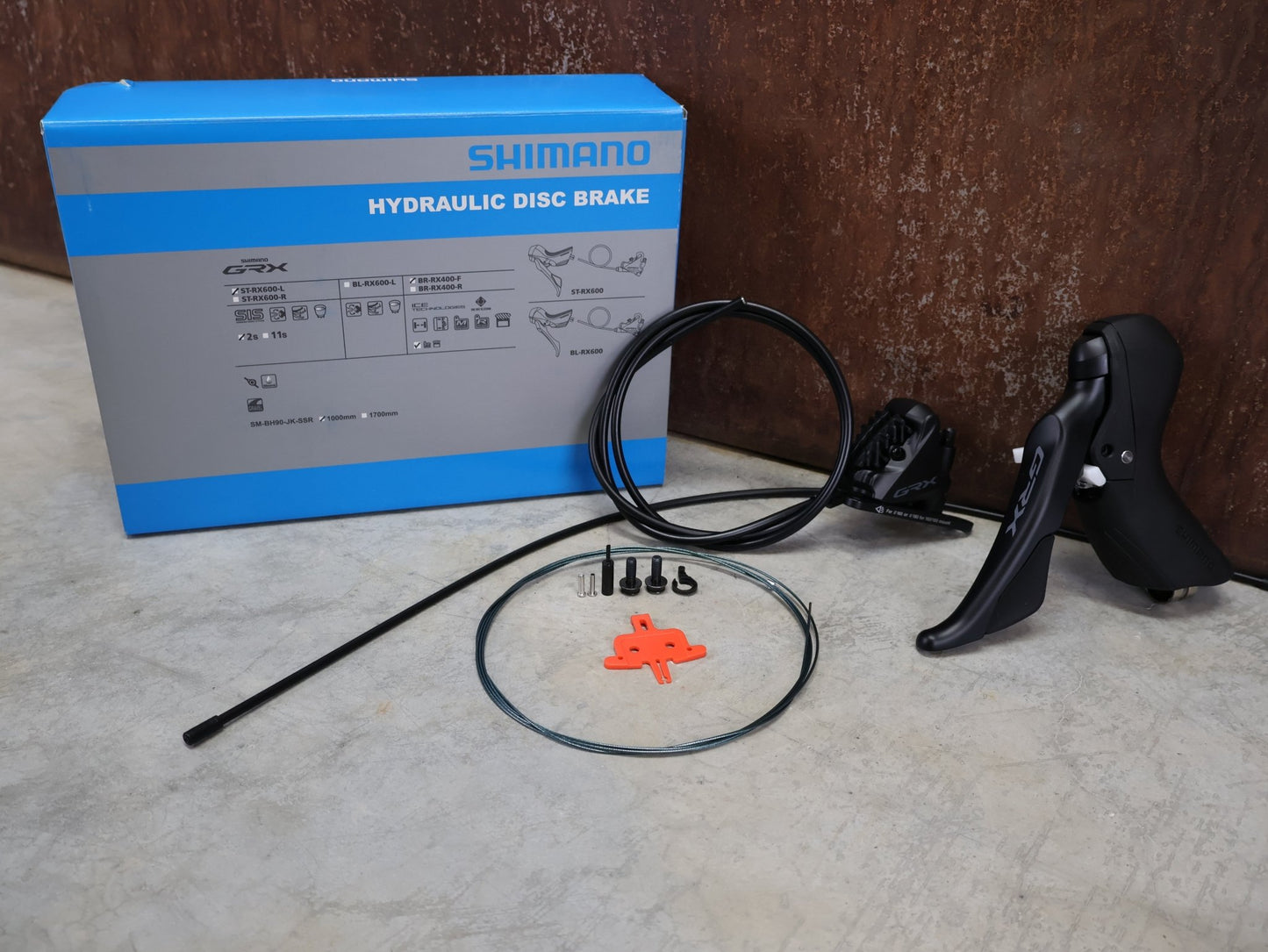 Brems - / Schalthebel von Shimano, SHIMANO GRX SCHEIBENBREMSE ST - RX600 / BR - RX400 vor USEDBIKES - OB.DE Hintergrund