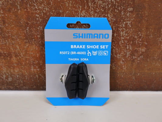 Bremsbelag von Shimano, SHIMANO R50T2 BREMSSCHUHE / 1 PAAR / FÜR ALU - FELGEN / Y - 8JY98070 vor USEDBIKES - OB.DE Hintergrund