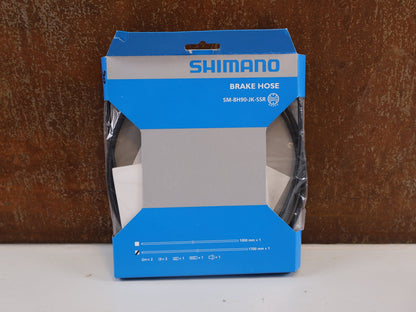 Bremsleitung von Shimano, SHIMANO ROAD SM - BH90 - JK - SSR BREMSLEITUNG / 1700MM / GERADER ANSCHLUSS / KÜRZBAR / 4524667890867 vor USEDBIKES - OB.DE Hintergrund