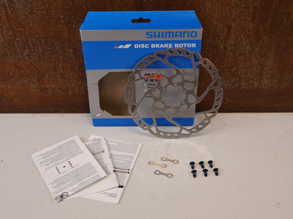 Bremsscheibe von Shimano, SHIMANO SLX SM RT66 BREMSSCHEIBE 180MM 6 LOCH vor USEDBIKES-OB.DE Hintergrund