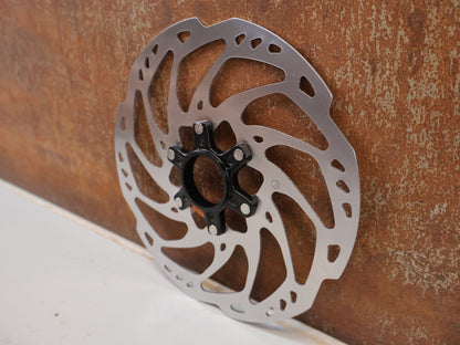 Bremsscheibe von Shimano, SHIMANO SLX SM-RT70 BREMSSCHEIBE 203MM / CENTERLOCK ICE-TECH MTB vor USEDBIKES-OB.DE Hintergrund