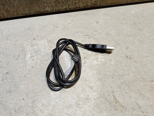 Di2 Zubehör von Shimano, SHIMANO SM - BCR2 DI2 LADEGERÄT FÜR INTERNEN AKKU vor USEDBIKES - OB.DE Hintergrund