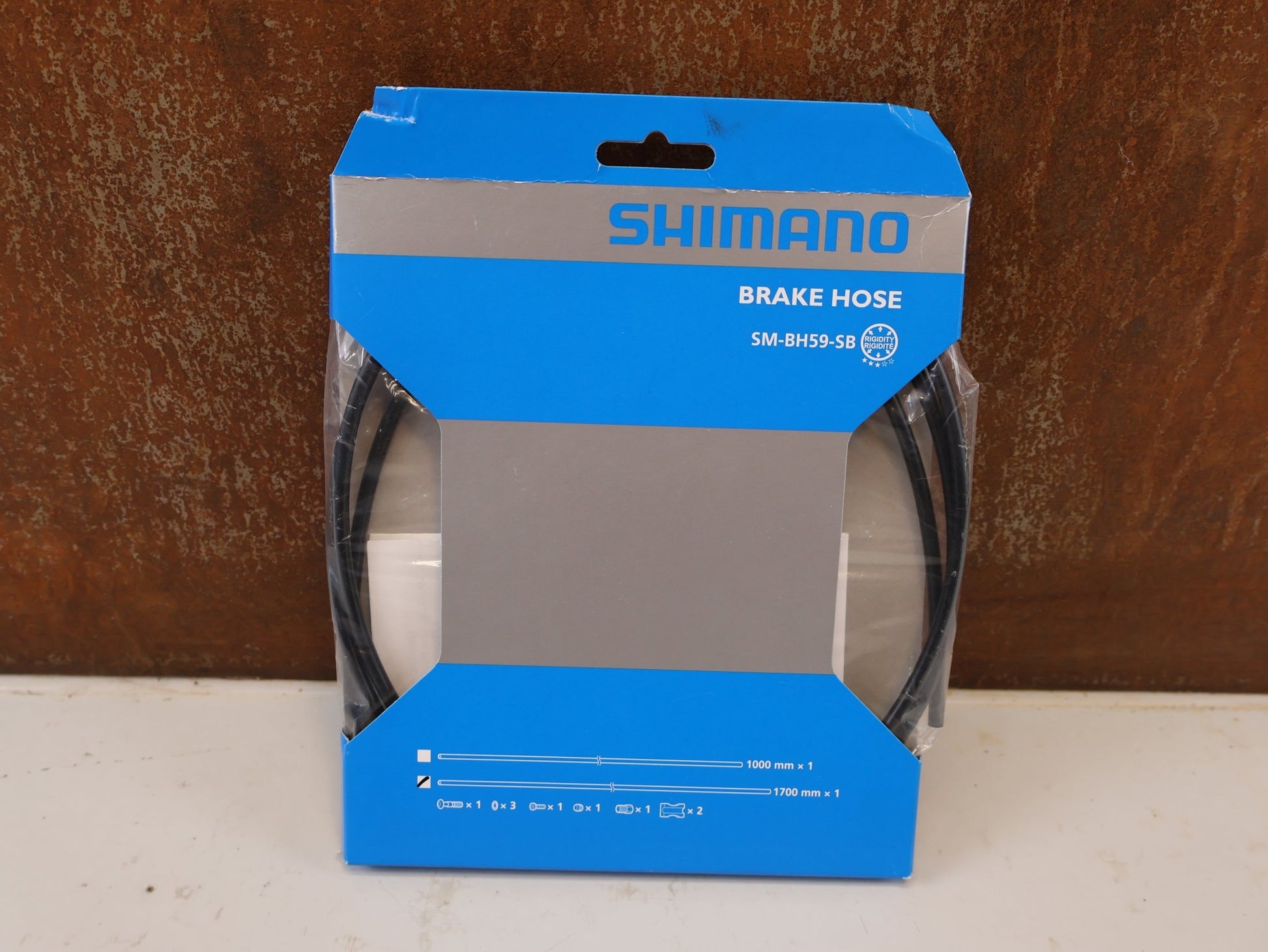 Bremsleitung von Shimano, SHIMANO SM BH59 SB BREMSLEITUNG 1700MM SCHWARZ vor USEDBIKES-OB.DE Hintergrund