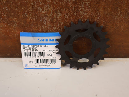 Kassette & Zahnkränze von Shimano, SHIMANO SM GEAR RITZEL / SPROCKET WHEEL / GETRIEBENABEN / 21 / 22 ZÄHNE NEXUS ALFINE SCHWARZ vor USEDBIKES-OB.DE Hintergrund