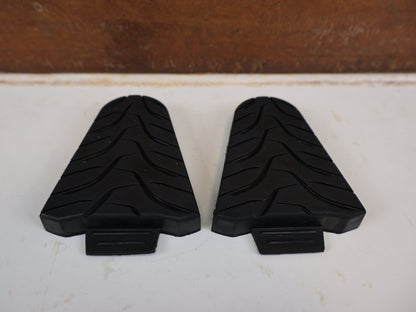Pedale von Shimano, SHIMANO SM-SH45 CLEAT COVER SCHUHPLATTEN ABDECKUNG SPD-SL / ESMSH45 vor USEDBIKES-OB.DE Hintergrund