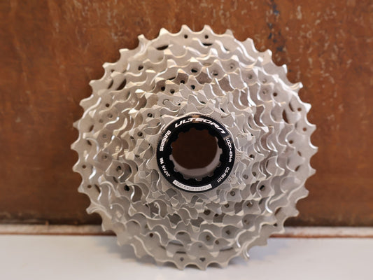 Kassette & Zahnkränze von Shimano, SHIMANO ULTEGRA CS R8101 KASSETTE 12 FACH 11 34Z RENNRAD HG 12 vor USEDBIKES-OB.DE Hintergrund