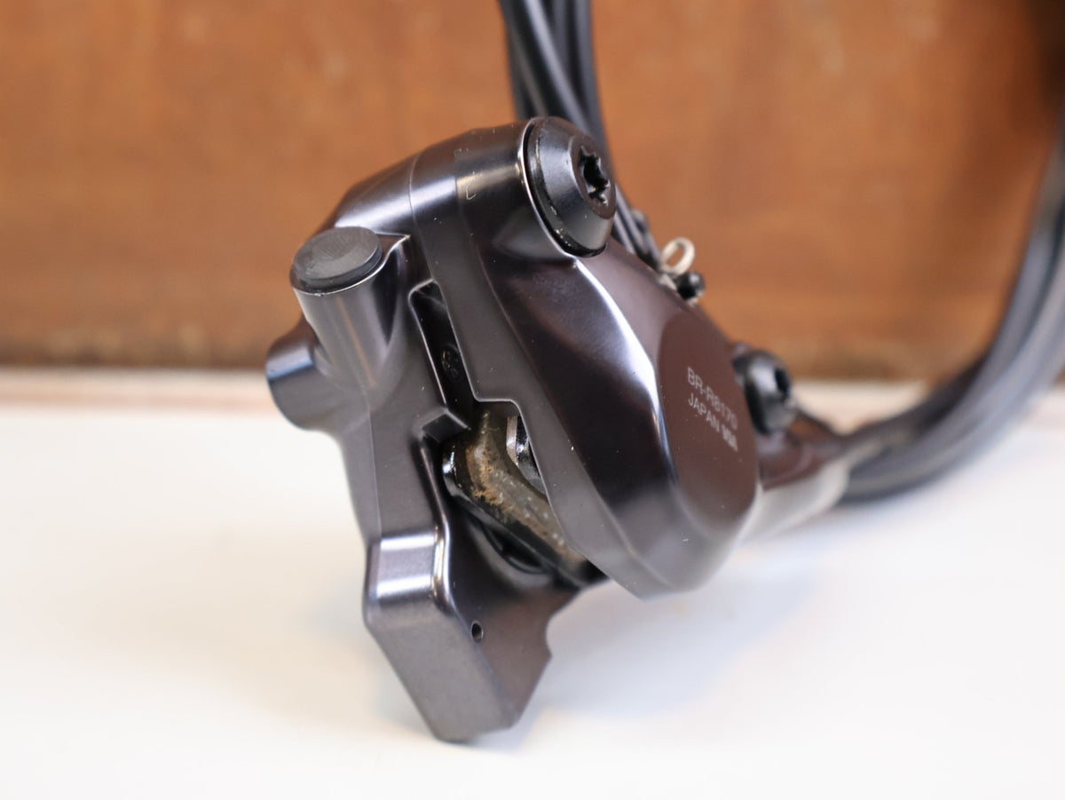 Brems-/ Schalthebel von Shimano, SHIMANO ULTEGRA DI2 ST R8170 BR R8170 SCHEIBENBREMSE VR ODER HR vor USEDBIKES-OB.DE Hintergrund