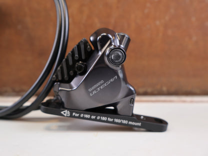 Brems-/ Schalthebel von Shimano, SHIMANO ULTEGRA DI2 ST R8170 BR R8170 SCHEIBENBREMSE VR ODER HR vor USEDBIKES-OB.DE Hintergrund