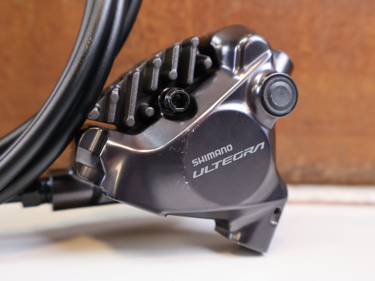 Brems-/ Schalthebel von Shimano, SHIMANO ULTEGRA DI2 ST R8170 BR R8170 SCHEIBENBREMSE VR ODER HR vor USEDBIKES-OB.DE Hintergrund